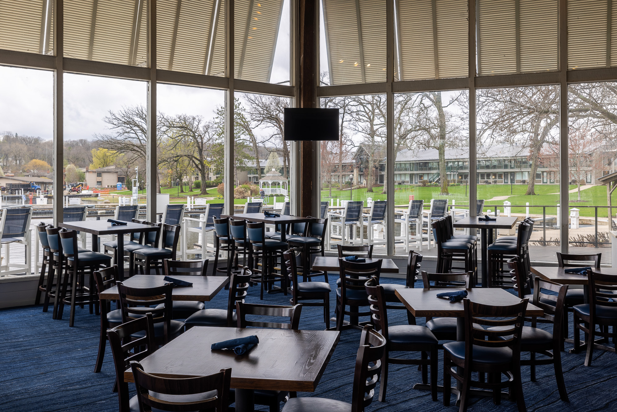 Bright waterfront dining room overlooking the marina