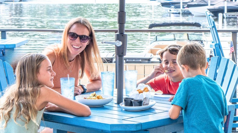 Family dining on the waterfront
